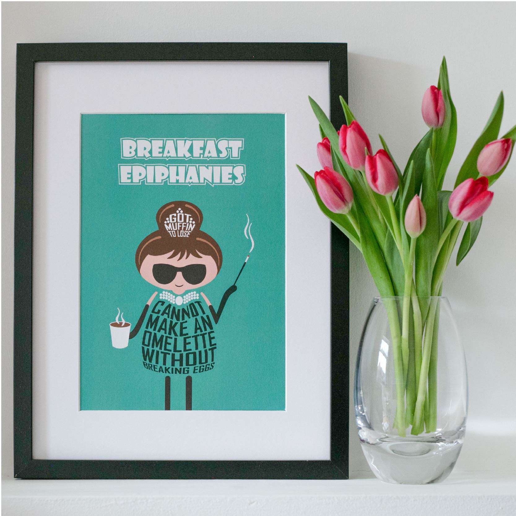 Proudly designed and printed in the UK on high quality, FSC-certified, 350gsm board, this unframed A4 print is headlined "Breakfast Epiphanies" - a cute take on Breakfast at Tiffany's. The Audrey Hepburn-inspired cartoon character's clothing then expresses the additional wording: "Got muffin to lose" and "Cannot make an omelette without breaking eggs"