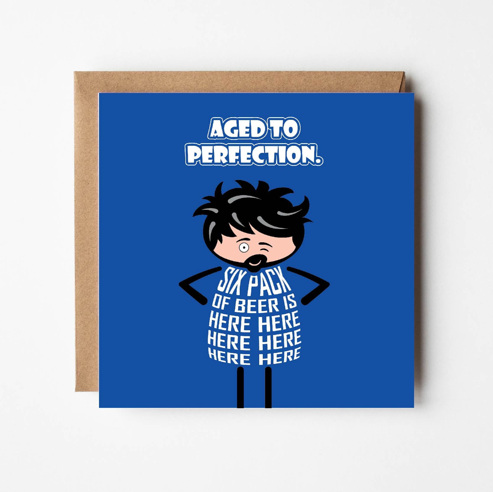 Card titled “Aged to Perfection” in white text on a blue background.  A cartoon man stands with hands on hips.  His body is made of text which states “Six pack of beer is here here here here here here.”  Card is 150mm square with a eco-Kraft envelope. 