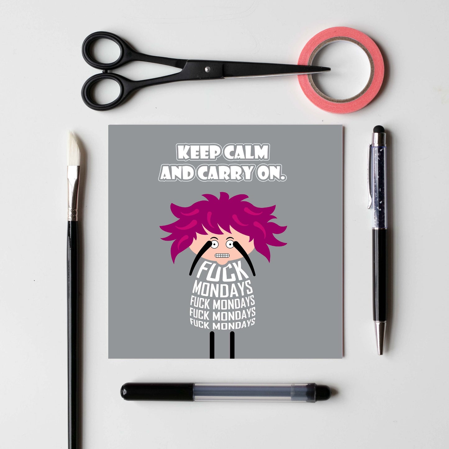 Card titled “Keep calm and carry on” in white text on a grey background.  A cartoon lady with wild pink hair grimaces while her body if formed of text which repeatedly states Fuck Mondays. Card is 150mm square and supplied with eco-Kraft envelope. 