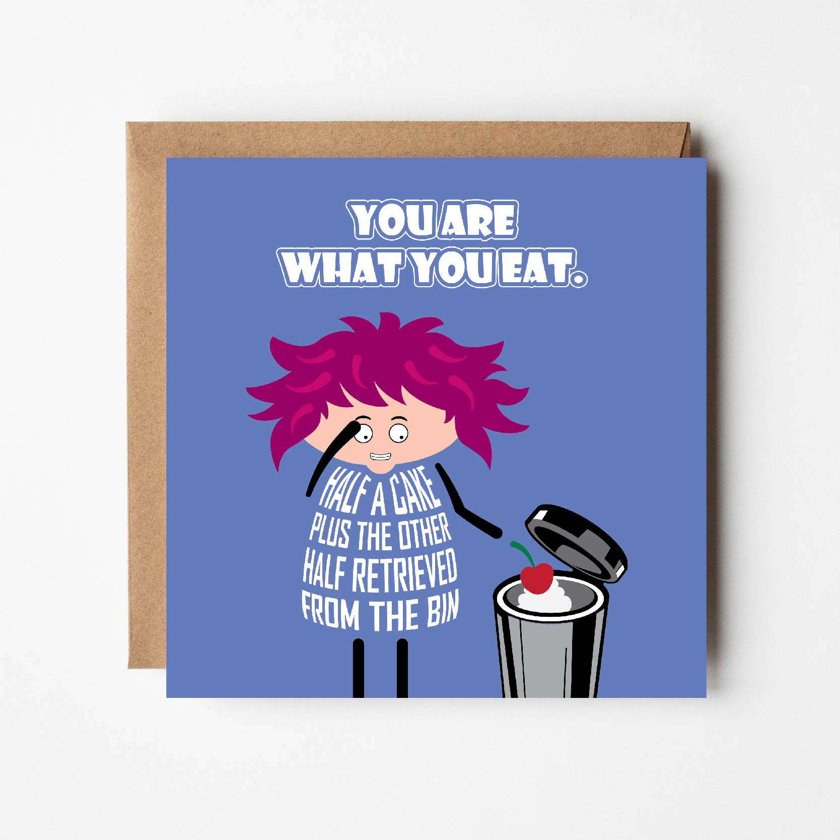 Card titled “You are what you eat” in white text on a blue background. A cartoon lady with wild pink hair looks into her trash can filled with cake.  Her dress is formed from text which states “Half a cake plus the other half retrieved from the bin.”  Card is 150mm square. Supplied with eco-Kraft envelope. 