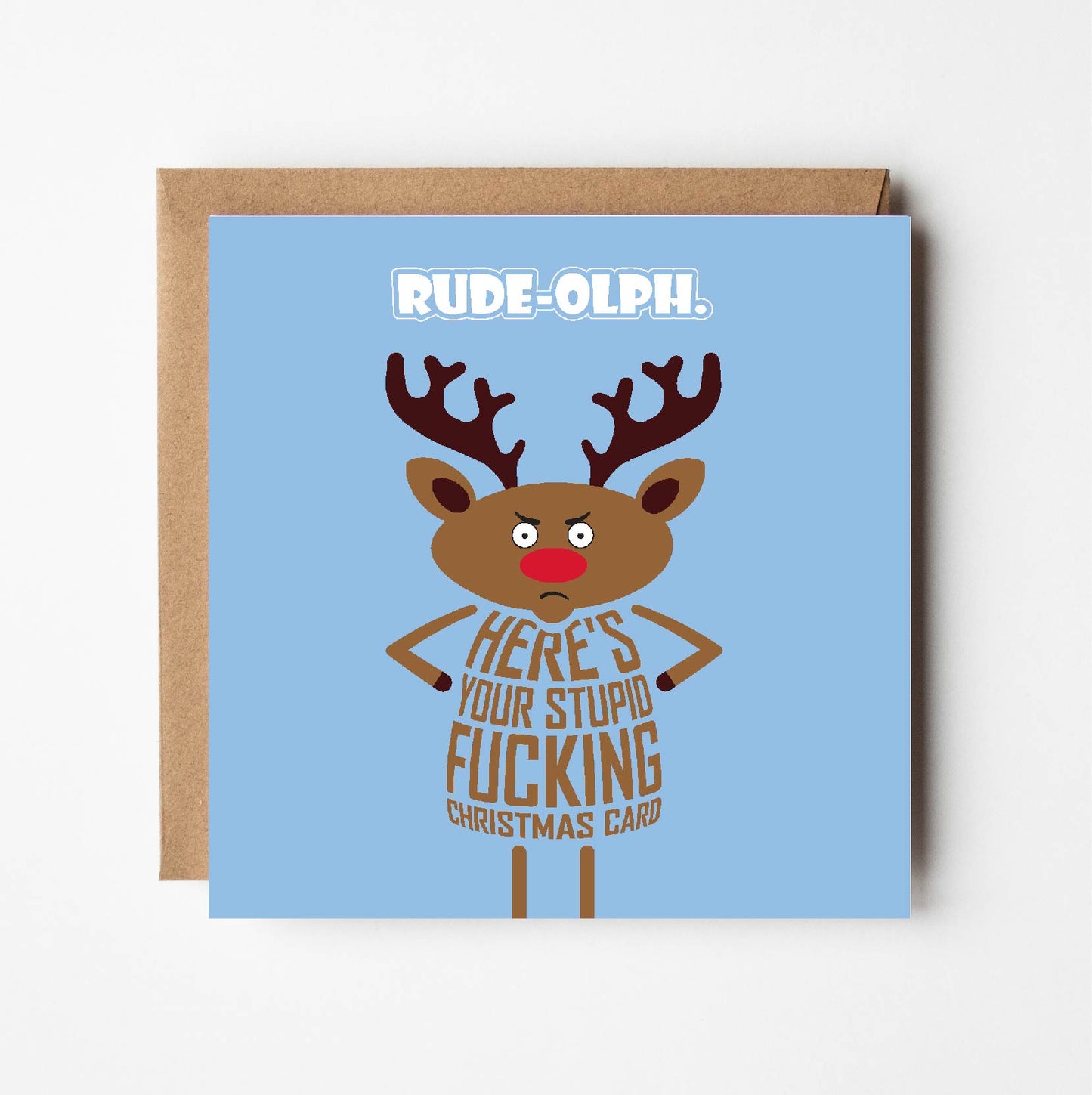 Card titled Rude-Olph in white text on blue background. A grumpy cartoon reindeer stands with hands on hips saying “Here’s your stupid fucking Christmas card. Card is 150mm square with eco-Kraft envelope.