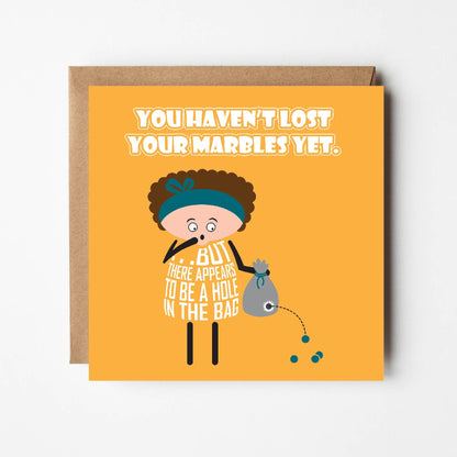 Card titled You haven’t lost your marbles yet in white text on yellow background. Cartoon lady holds bag of marbles with a hole in it and some of them dropping out. Additional text says “But there appears to be a hole in the bag”