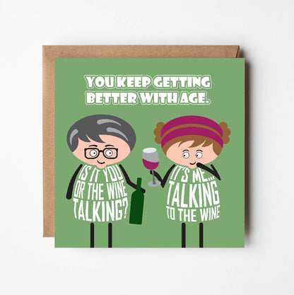 Card titled You keep getting better with age.  A cartoon man holds a bottle of wine and asks Is that you or the wine talking? The lady replies Its me talking to the wine. Card 150mm square supplied with eco-Kraft envelope.