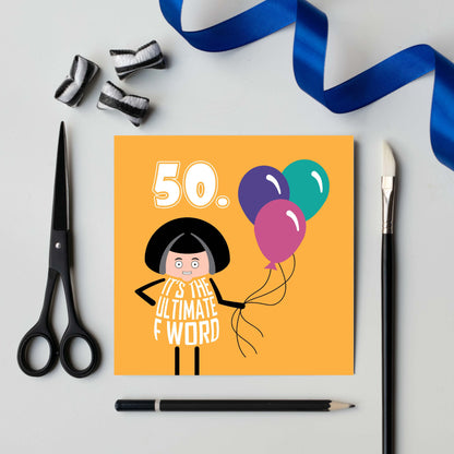 Text on card says Fifty in white text on yellow background.  A cartoon lady with a wry smile on her face holds a balloon. Lettering on her dress says It's the Ultimate F Word.  Card is 150mm square and supplied with eco-Kraft envelope.